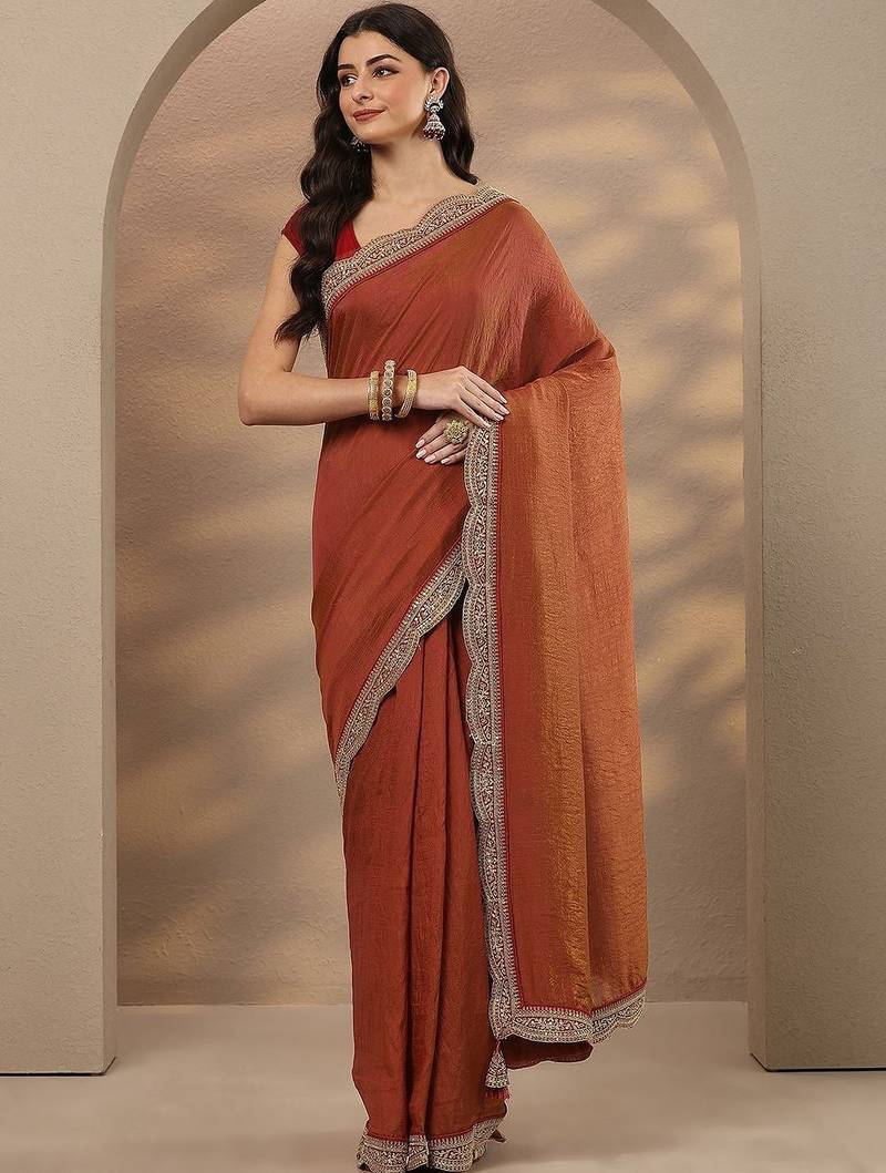 rust solid saree with unstitched blouse piece