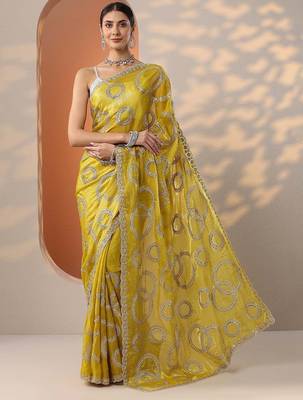 yellow embroidered organza saree with unstitched blouse piece 1