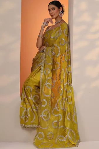 yellow embroidered organza saree with unstitched blouse piece