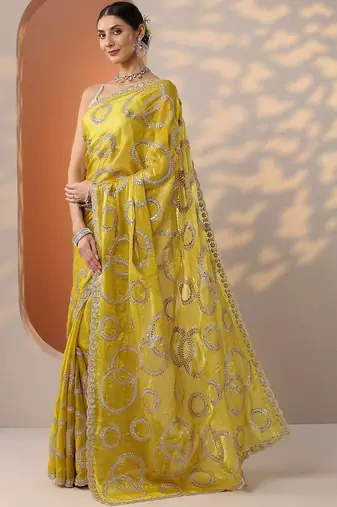 yellow embroidered organza saree with unstitched blouse piece