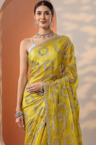 yellow embroidered organza saree with unstitched blouse piece