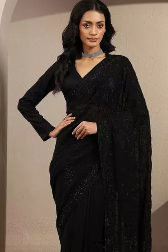 black embroidered saree with unstitched blouse piece