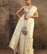 cream woven design saree with unstitched blouse piece