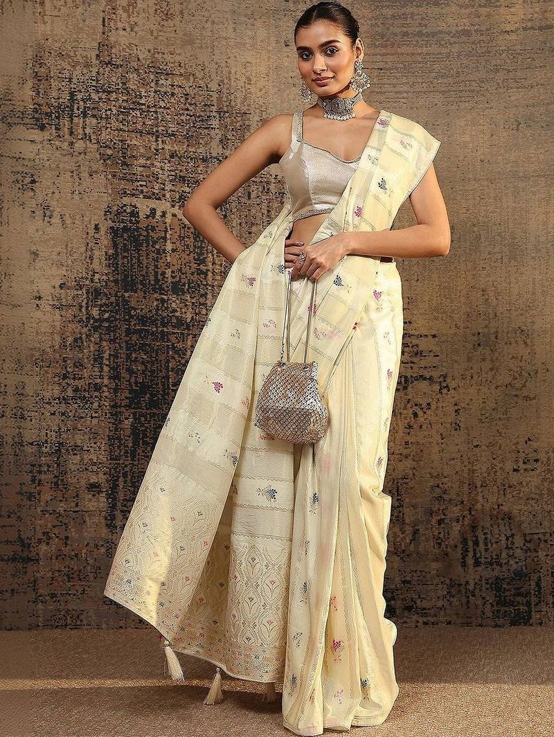 cream woven design saree with unstitched blouse piece