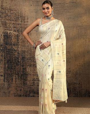 cream woven design saree with unstitched blouse piece 4