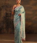 sea green ethnic motifs embroidered saree with unstitched blouse piece