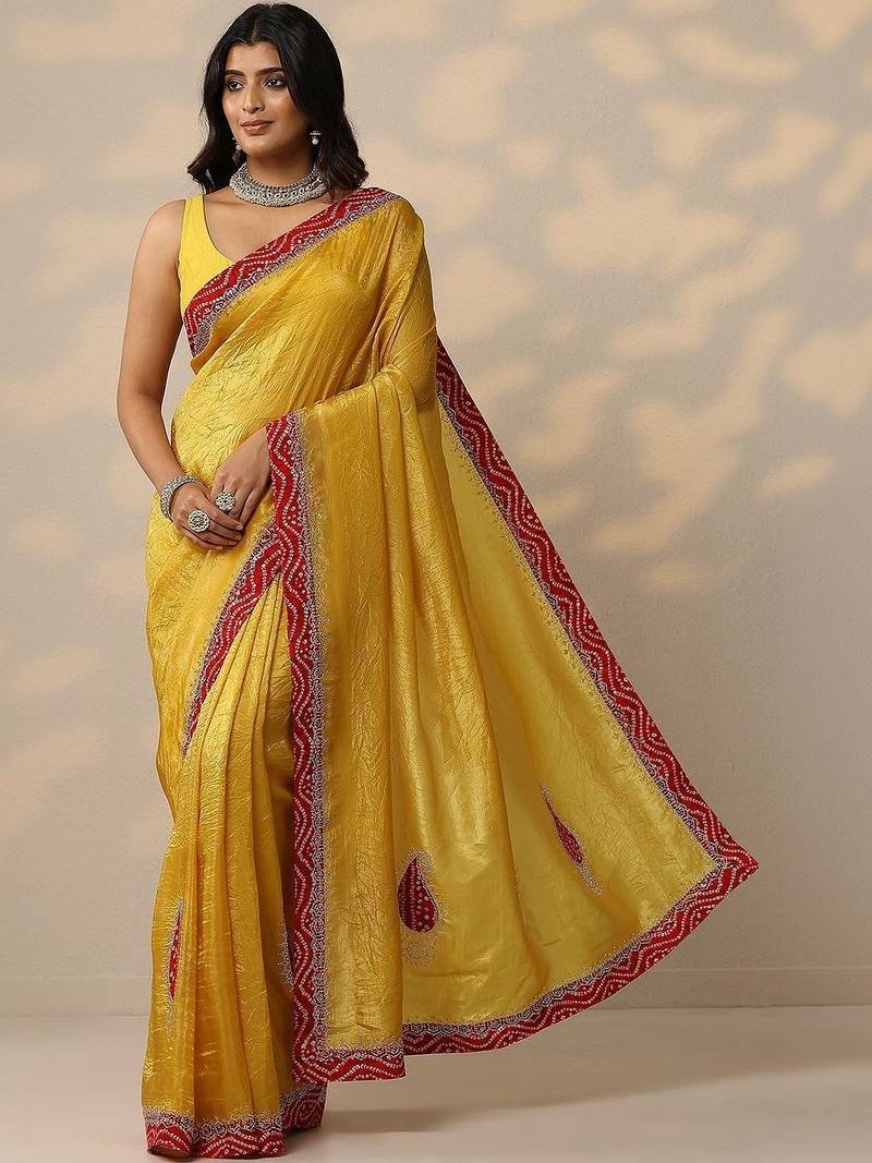 yellow embellished organza sarees with unstitched blouse piece