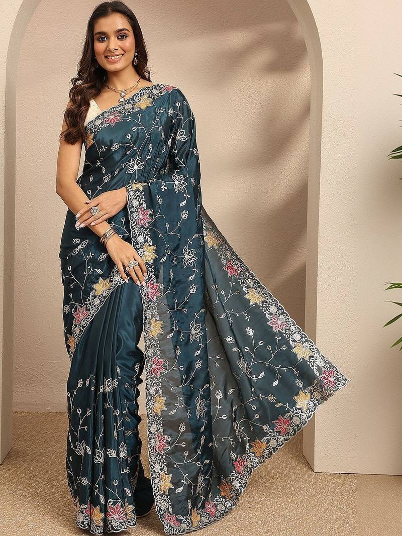 teal embroidered saree with unstitched blouse piece