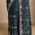 teal embroidered saree with unstitched blouse piece
