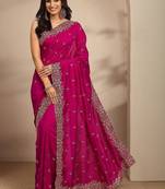 magenta floral zari embroidered saree with zari embellished border and a blouse piece