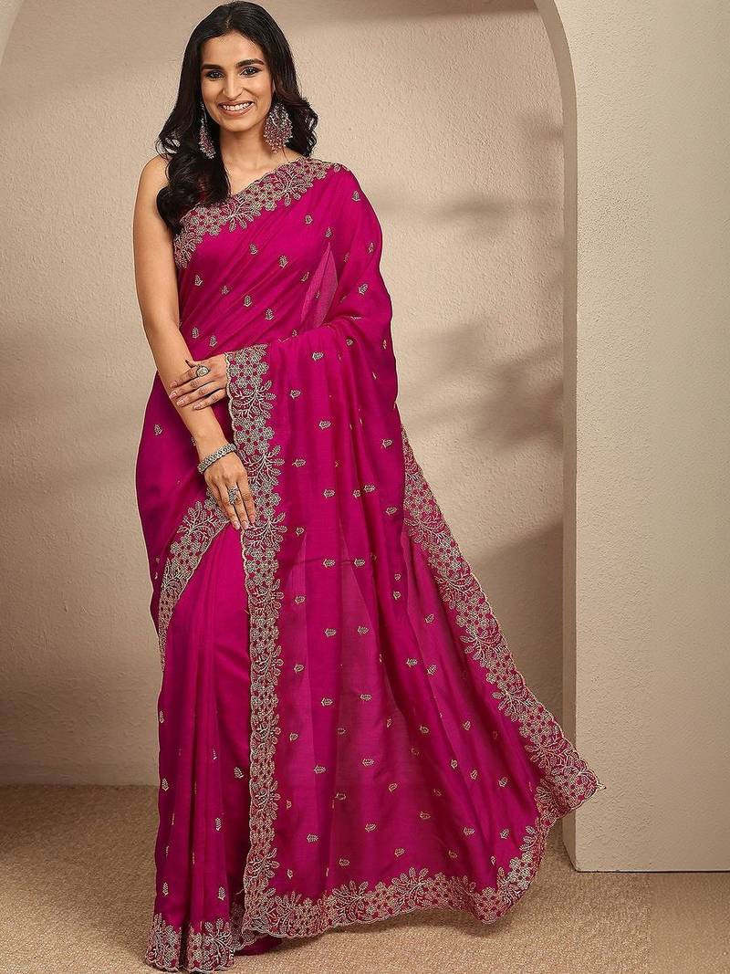 magenta floral zari embroidered saree with zari embellished border and a blouse piece