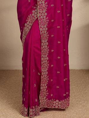 magenta floral zari embroidered saree with zari embellished border and a blouse piece 3