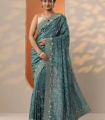 teal embroidered organza saree with unstitched blouse piece