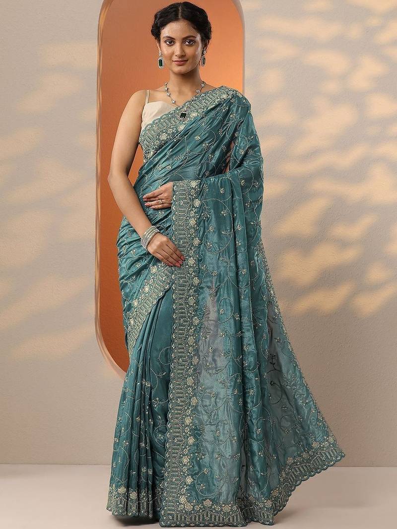 teal embroidered organza saree with unstitched blouse piece