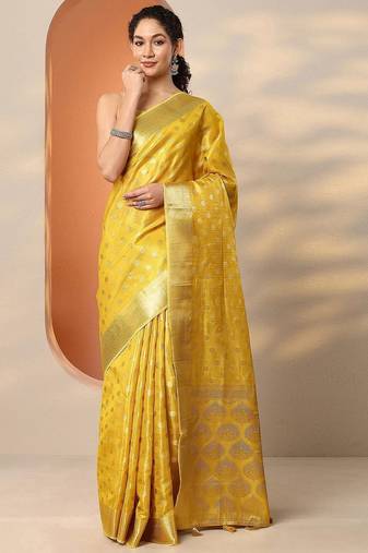yellow woven design saree with unstitched blouse piece