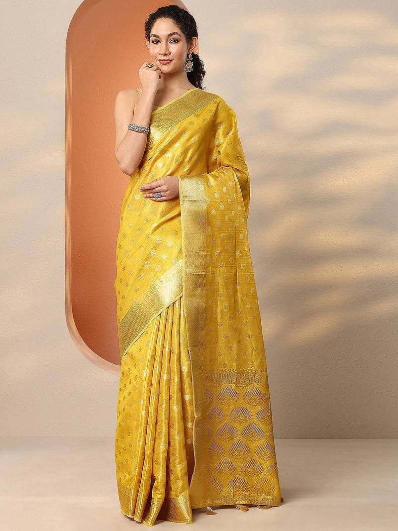 yellow woven design saree with unstitched blouse piece