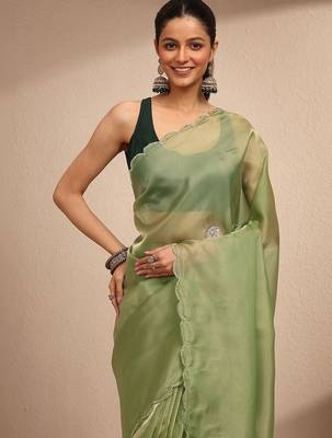 green embellished saree with unstitched blouse piece 1