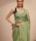 green embellished saree with unstitched blouse piece