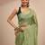 green embellished saree with unstitched blouse piece