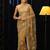 gold butter yellow floral embellished net saree