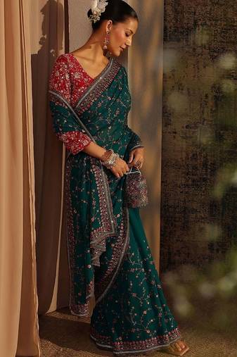 teal floral embroidered net saree