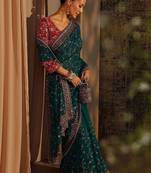 teal floral embroidered net saree