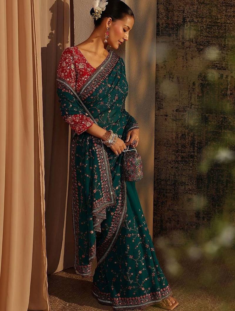 teal floral embroidered net saree