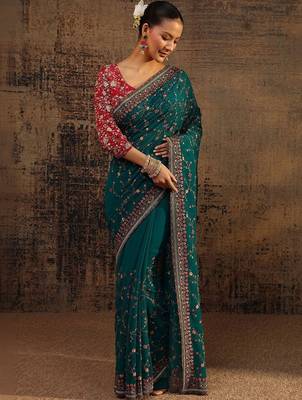 teal floral embroidered net saree 2