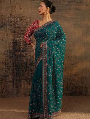 teal floral embroidered net saree 3