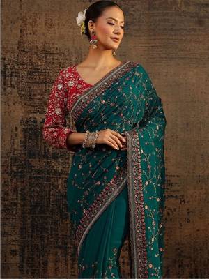 teal floral embroidered net saree 5