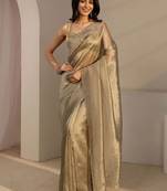 gold beads and stones tissue saree