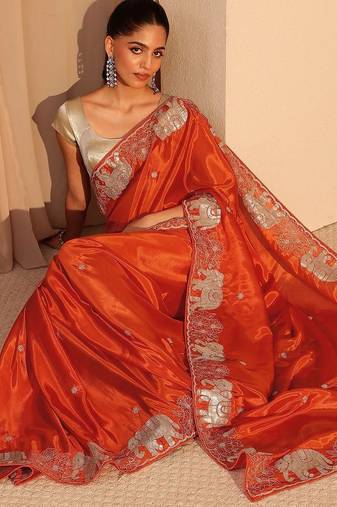 orange embellished satin saree with animal motif border