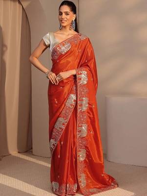 orange embellished satin saree with animal motif border 4
