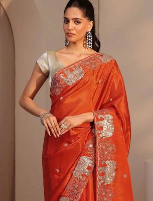 orange embellished satin saree with animal motif border 5