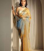 gold beads and stones tissue saree