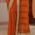 orange striped textured chiffon saree