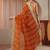 orange striped textured chiffon saree