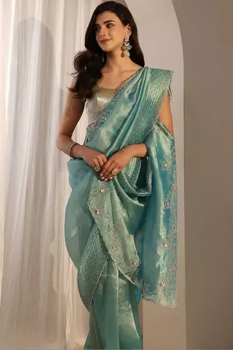 turquoise blue beads and stones tissue saree