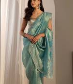 turquoise blue beads and stones tissue saree
