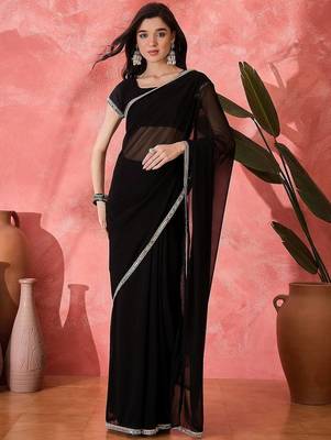 Women Black Georgette Solid Saree with stitched Blouse 1