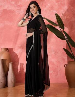 Women Black Georgette Solid Saree with stitched Blouse 4