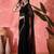 Women Black Georgette Solid Saree with stitched Blouse