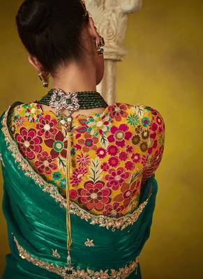 Green pure based fancy fabric embroidery saree 3