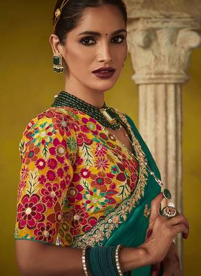 Green pure based fancy fabric embroidery saree 4