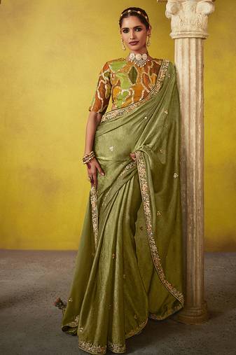 Olive pure based fancy fabric embroidery saree