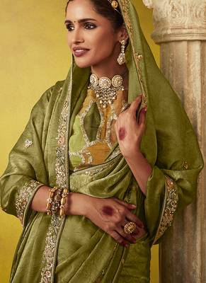 Olive pure based fancy fabric embroidery saree 5