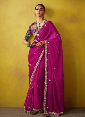 Magenta pure based fancy fabric embroidery saree 1