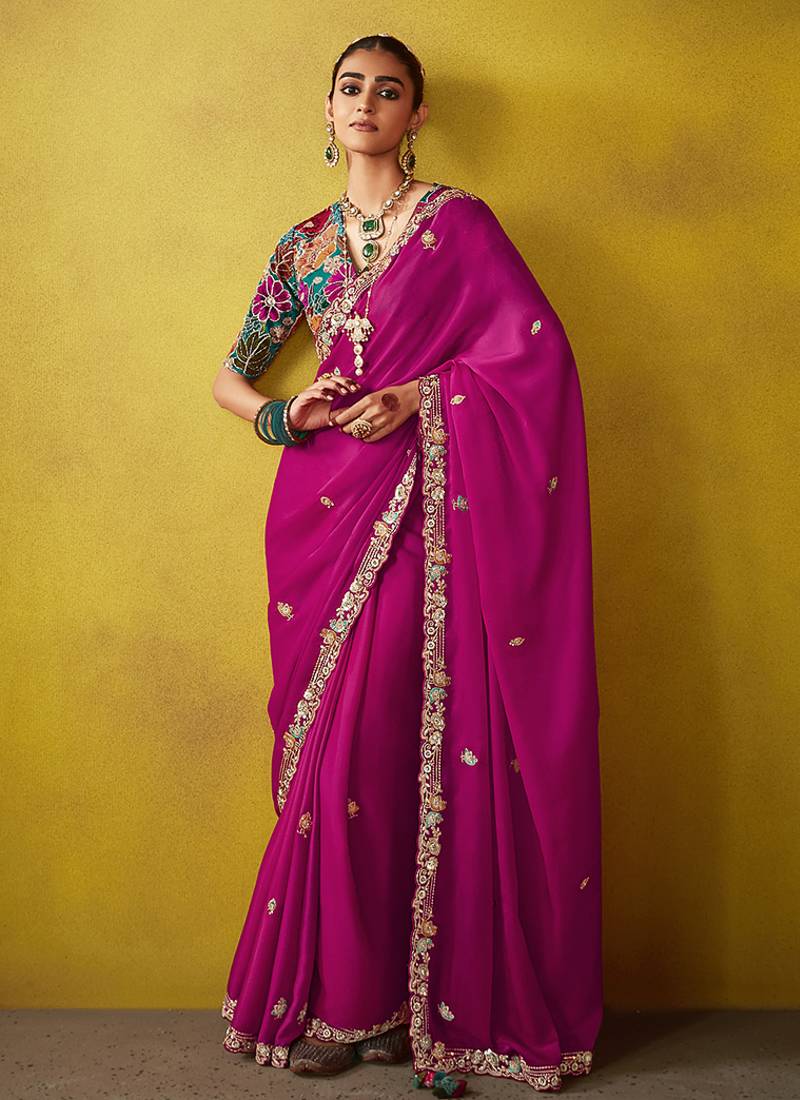 Magenta pure based fancy fabric embroidery saree