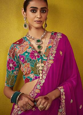 Magenta pure based fancy fabric embroidery saree 2