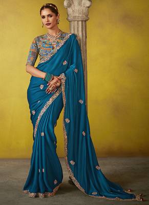 Teal pure based fancy fabric embroidery saree 1